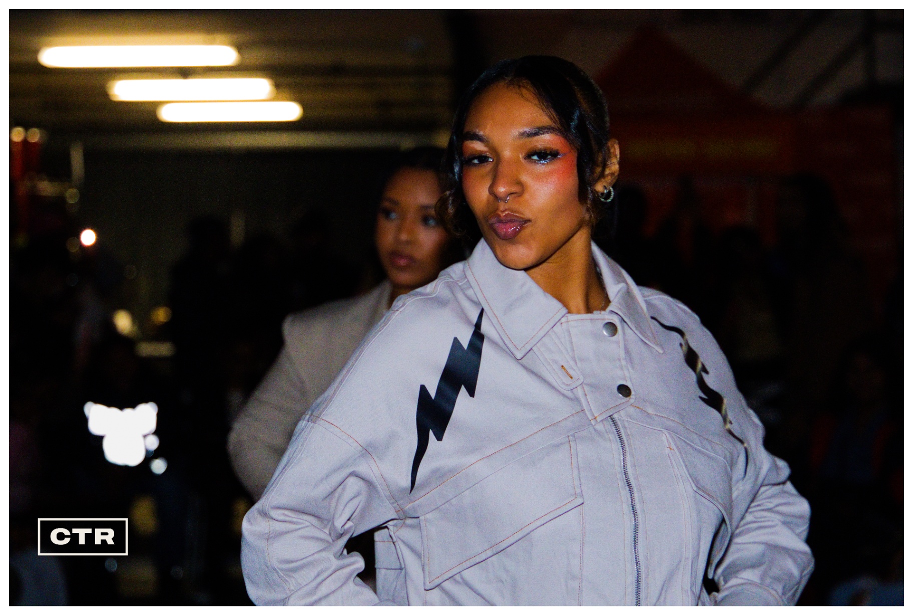 Runway — lightning-bolt jacket
